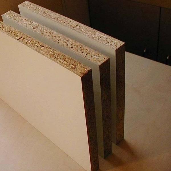 stack of three panel of chipboard